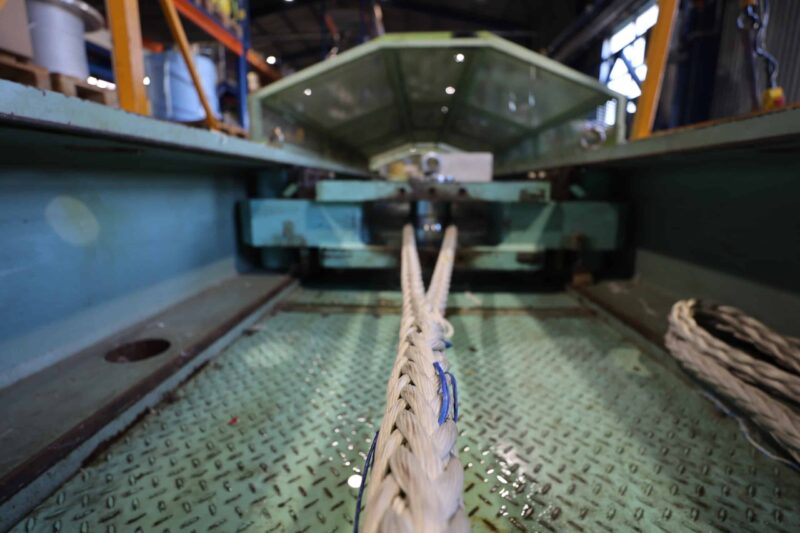 Industrial destructive break load testing of a synthetic HMPE rope on a tensile testing machine at TATRAROPES laboratory.